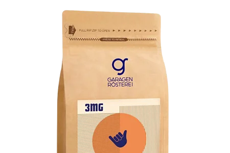 Braune Verpackung mit Aufschrift „Garagen Rösterei“ und „Omniroast“ für Kaffee, 500g Inhalt.